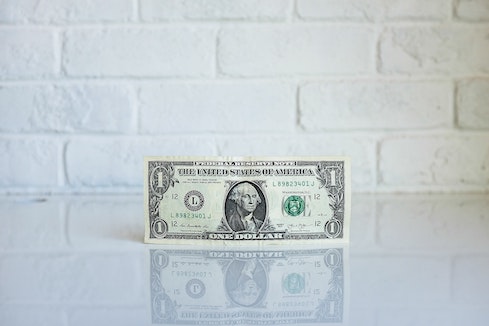 dollar bill on table
